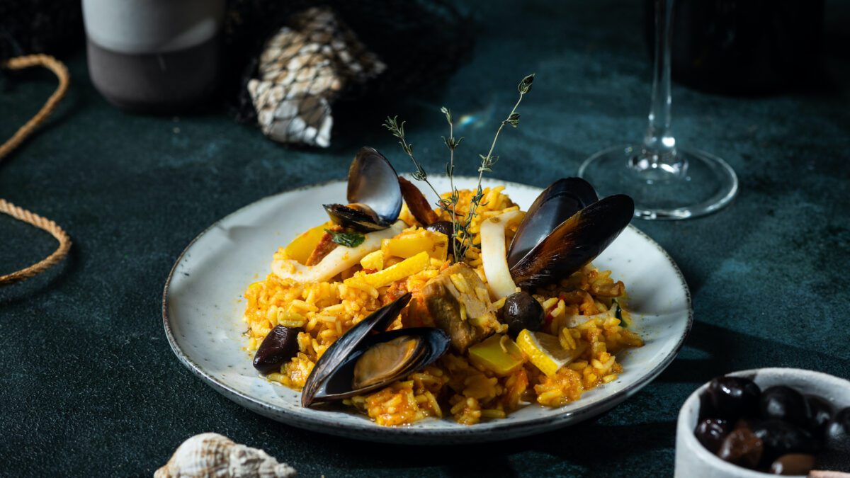 Classic Dish Of Spain, Seafood Paella. Spanish Paella With Shrimps, Clamps, Mussels. Mediterranean C